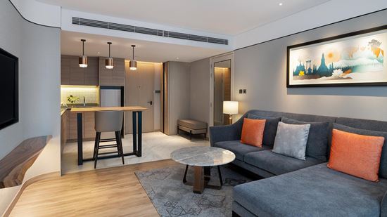 Spacious Living Room and Pantry Area in Club Two Bedroom Corner Suite