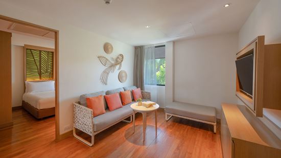 Living Area in Two Bedroom Family Suite Pool View